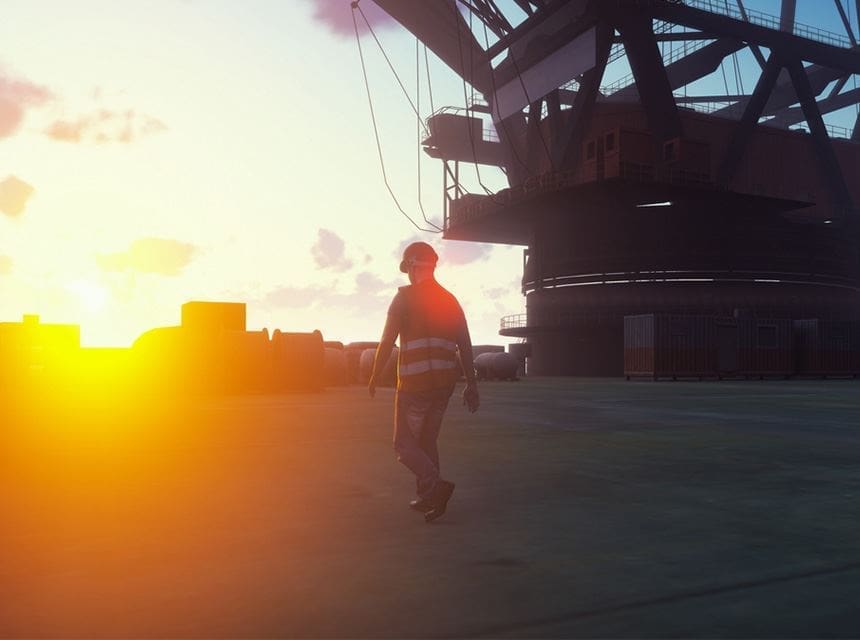 A person on a skateboard in the sunset.